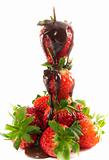 Melted chocolate on strawberry tower