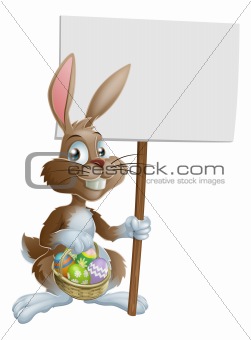 Easter bunny rabbit holding sign