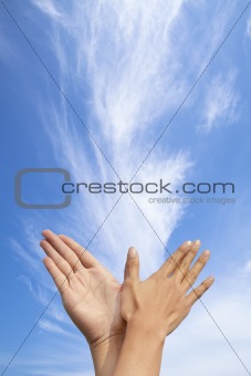 bird gesture by couple with cloud background