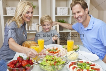 Parents Child Family Healthy Food & Salad At Dining Table 