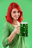 Redhead drinking green beer
