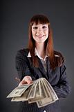Cheerful business woman with dollars 