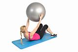 Female lying abs crunching exercise with fitness ball. position 2 of 2.