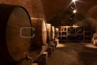 Wine barrels in the a wine cellar