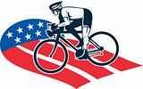 Cyclist riding racing bike star and stripes flag