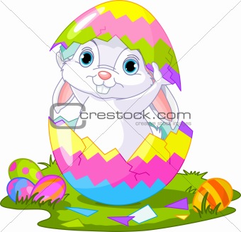 Easter. Bunny jumping out from  egg
