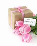 Bunch of tulips with present cart and gift box 