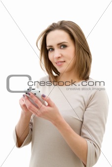 Beautiful young woman using mobile phone