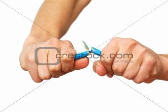 Hands breaking pencil