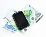 Modern mobile smart phone and  euro banknotes