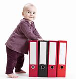 young child with four file folders
