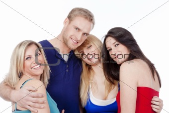 four young friends embracing, smiling, looking at camera - isolated on white