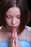 Praying young girl