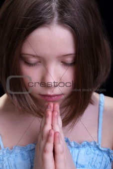 Praying young girl
