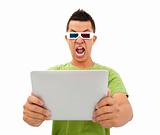 Surprised Young man in 3D glasses and watching the tablet pc