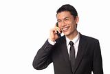 Young Asian Corporate Man Talking on the Phone Over White Background