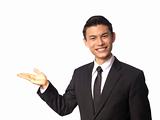 Young Asian Corporate Man presenting Over White Background
