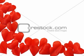 Petals in heart shape over white background - frame.