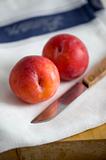 plums and knife