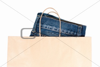 Jeans In Brown Paper Carrier Bag