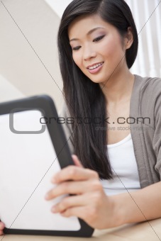 Asian Chinese Woman Using Tablet Computer
