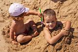 Kids playing in sand