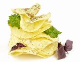 Potato Chips pyramid with basil and parsley
