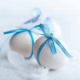 White Easter Eggs with Blue Ribbons