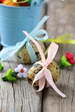 Easter quail eggs on wooden background