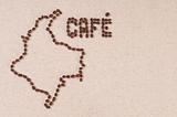 Coffee beans on canvas in the shape of Colombia and Cafe