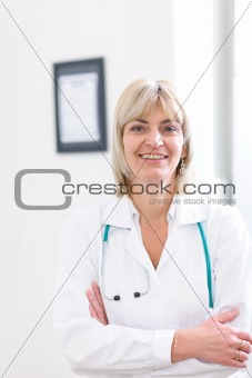 Portrait of smiling senior doctor