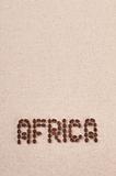 The word Africa written with coffee beans on canvas 