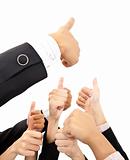 hand of business group with thumbs up