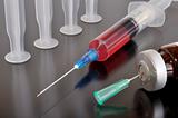 Disposable syringe and vaccine