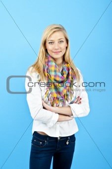 Young woman against the blue background