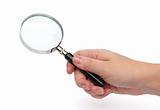 Hand holding a magnifying glass