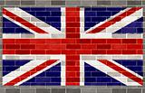 Flag of great britain on large rough gray brickswall