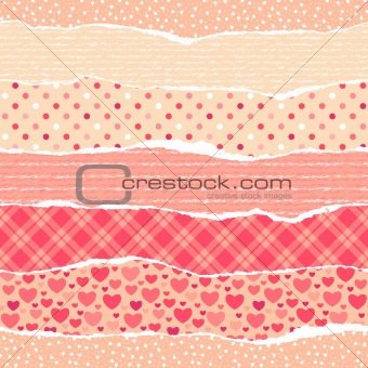 Torn wrapping paper with hearts.