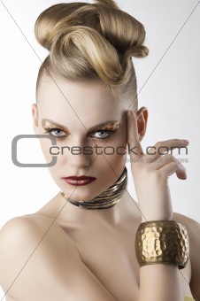 fashion girl with leopard makeup with finger near the face