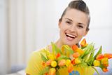 Beautiful woman with bouquet of tulips