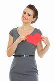Woman in dress with paper Valentines heart
