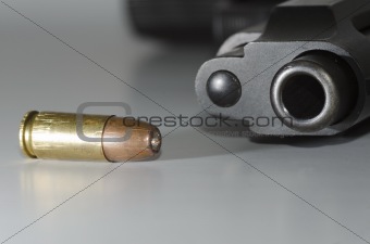 bullet and gun barrel