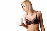 drinking girl in lingerie she looks in to the cup