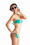 girl in beach wear with sunglasses with body turned in profile