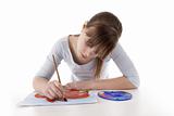 Girl drawing color flower