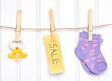 Baby Sale Goods on a Clothesline