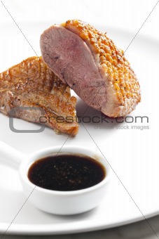 fried duck breast with sauce of honey, balsamico and red wine