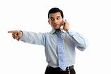 Businessman on telephone pointing