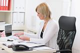 Senior business woman working with documents
