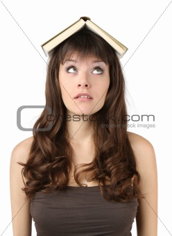 student girl with a roof in a book
